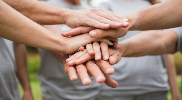 hands stacked showing teamwork